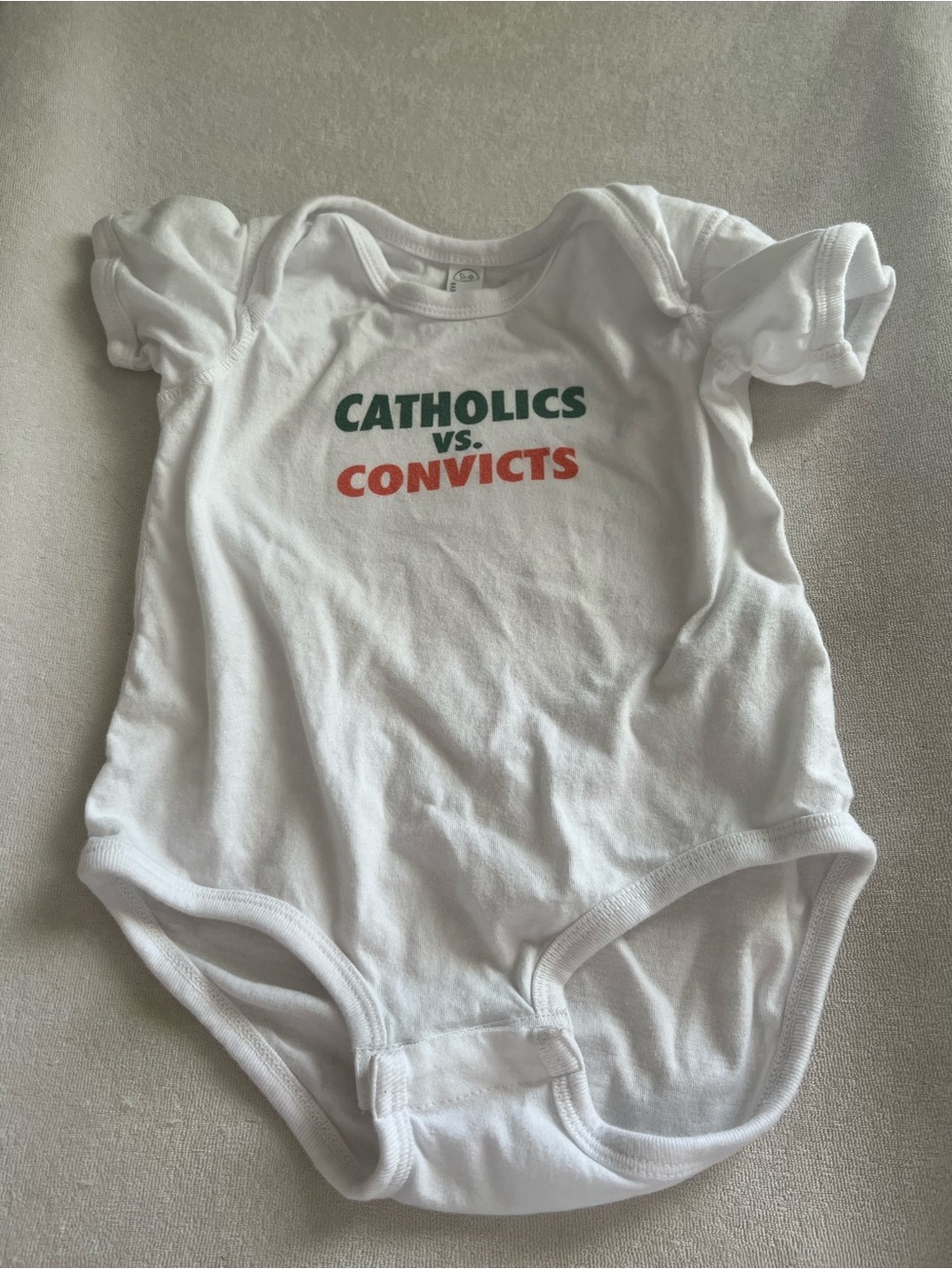 White 'Catholics vs. Convicts' One-Piece Bodysuit